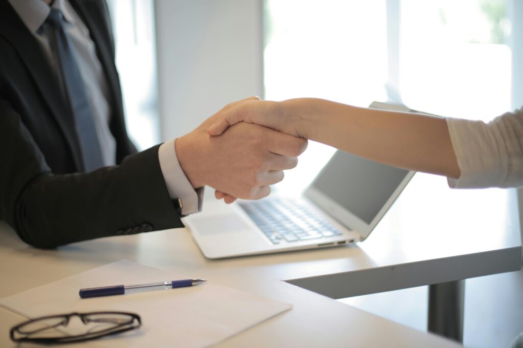 Handshake as part of merger and acquisition.