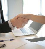 Handshake as part of merger and acquisition.