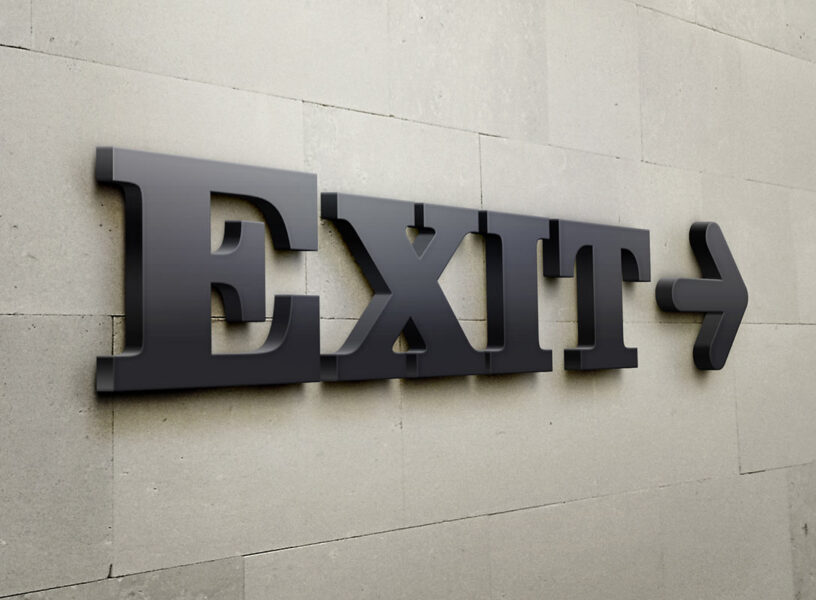 Exit-Planning_opt exit sign on wall